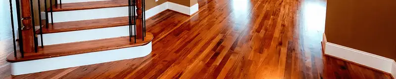 Base floor of a staircase with professionally restored wood flooring in Glendale AZ