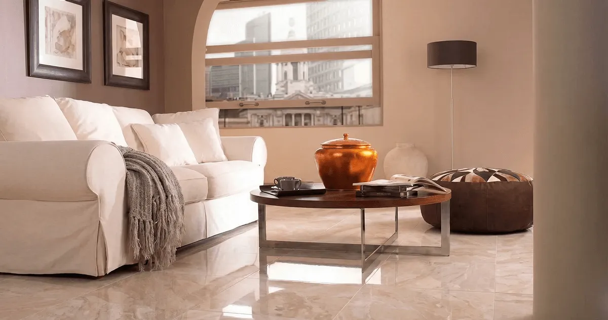 Modern living room with professionally installed marble flooring, a beige sofa, coffee table in Glendale, AZ