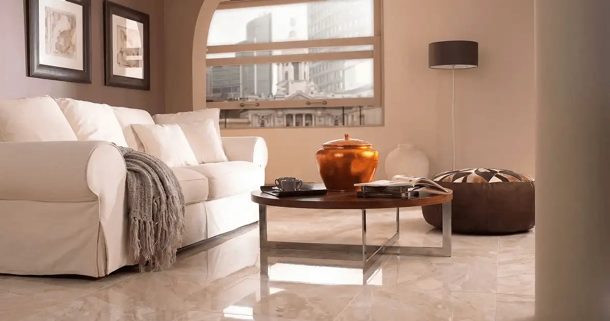 Modern living room with professionally installed marble flooring, a beige sofa, coffee table in Glendale, AZ
