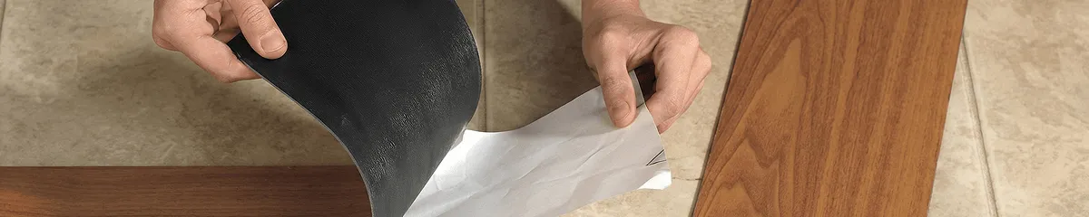 A professional installing vinyl flooring in Glendale, AZ