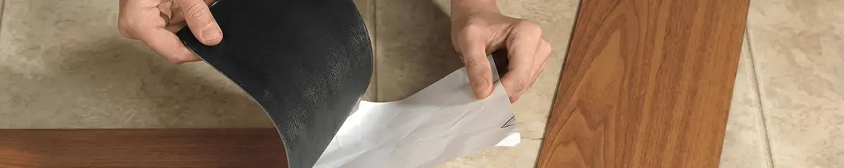 A professional installing vinyl flooring in Glendale, AZ